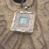 Magnificent Designer Two tone Pendant with light Blue Opal