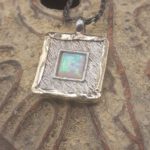 Magnificent Designer Two tone Pendant with light Blue Opal