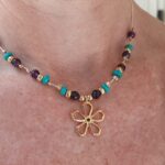 Designer beaded necklace combining Turquoise, faceted Amethyst & Gold beads with Gold floral pendant