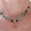 Turquoise, faceted Amethyst & Gold beaded necklace with Gold Hamsa pendant