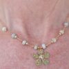 Gorgeous hand made Necklace Beaded with Amazonite faceted stone on Gold chain with hammer finish Gold flower