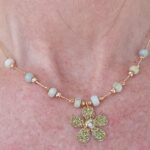 Gorgeous hand made Necklace Beaded with Amazonite faceted stone on Gold chain with hammer finish Gold flower