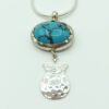 Hand made Oval 925 Sterling silver & Turquoise pendant with Hammer finish pomegranate charm